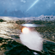 A screenshot from Exo One showing the alien spaceship rolling across a rocky planet surface.
